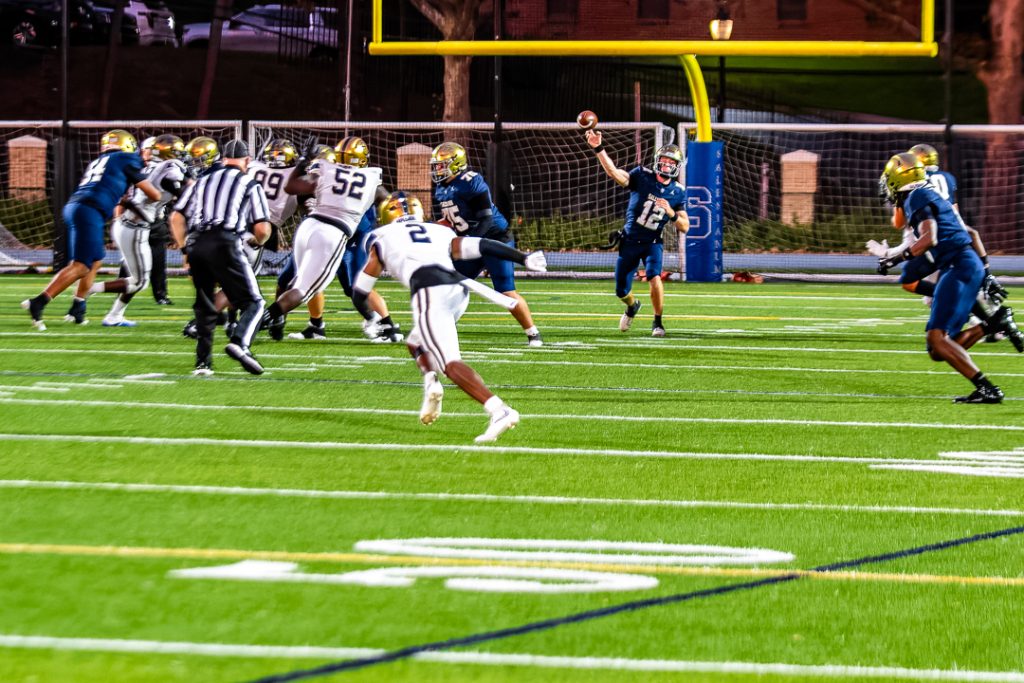 Sallies quarterback Brady Nabb fires a pass on the game's opening possession.