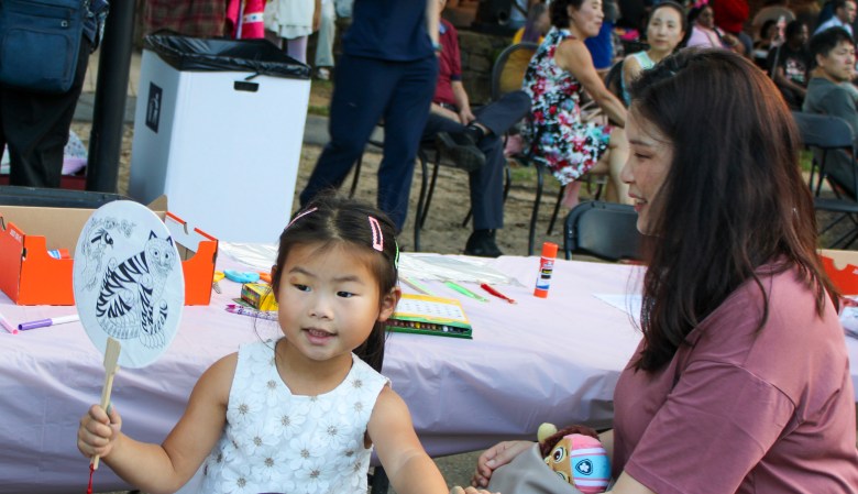 A young girl at an activity table
