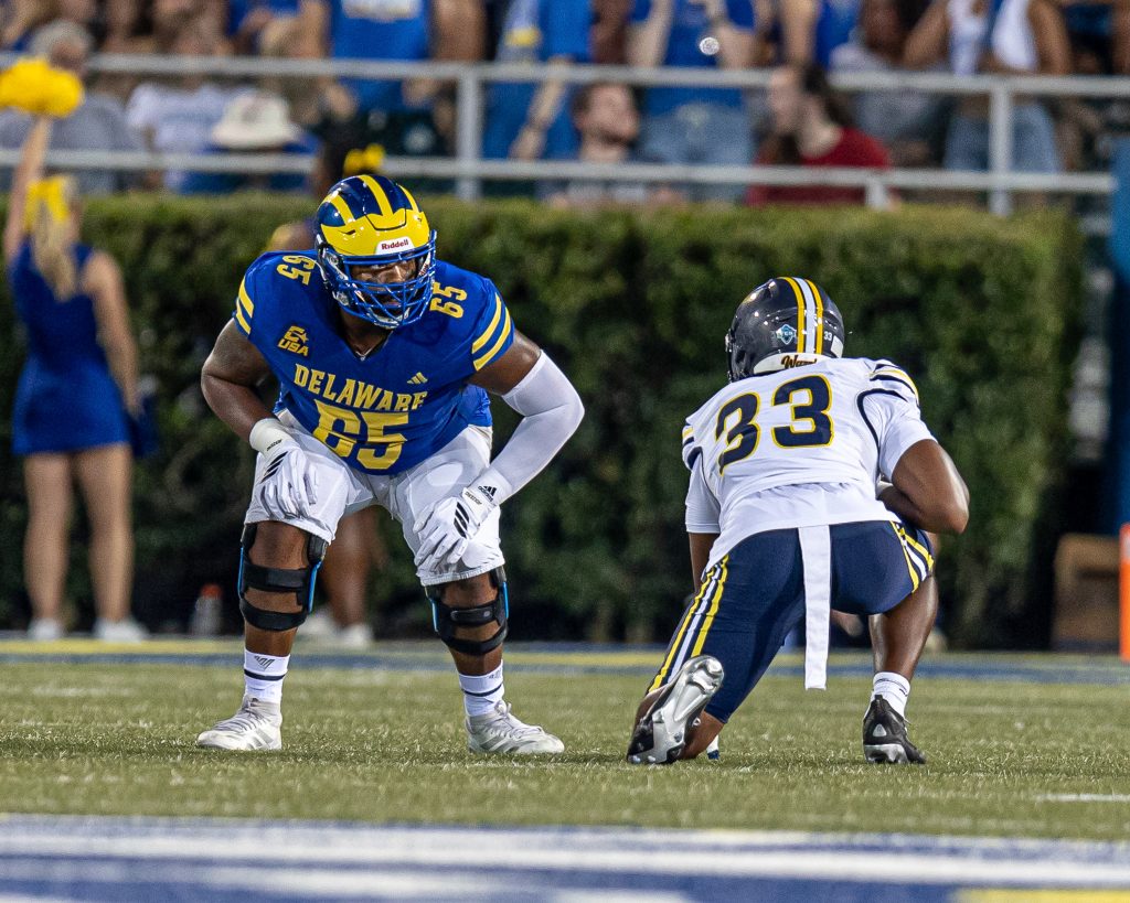 Wahkeem Roman lines up on the left side of the offensive line against Merrimack. This was his first time playing for the Blue Hens since transferring into the program during the spring of 2024. Photo Credit: University of Delaware Football.