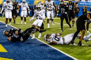Delaware quarterback Nick Minicucci dives into the endzone for his lone rushing touchdown against Missouri State. Photo credit: Dave Reeder