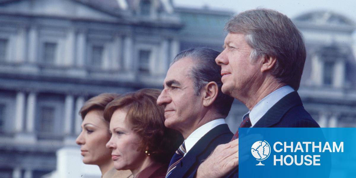 The Shah of Iran standing next to US President Jimmy Carter in 1977.
