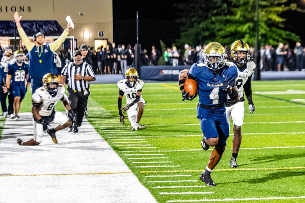 Sallies senior Tysir Jones races down the right sideline on his 78-yard reception. This play came right after La Salle took the lead on its prior drive.