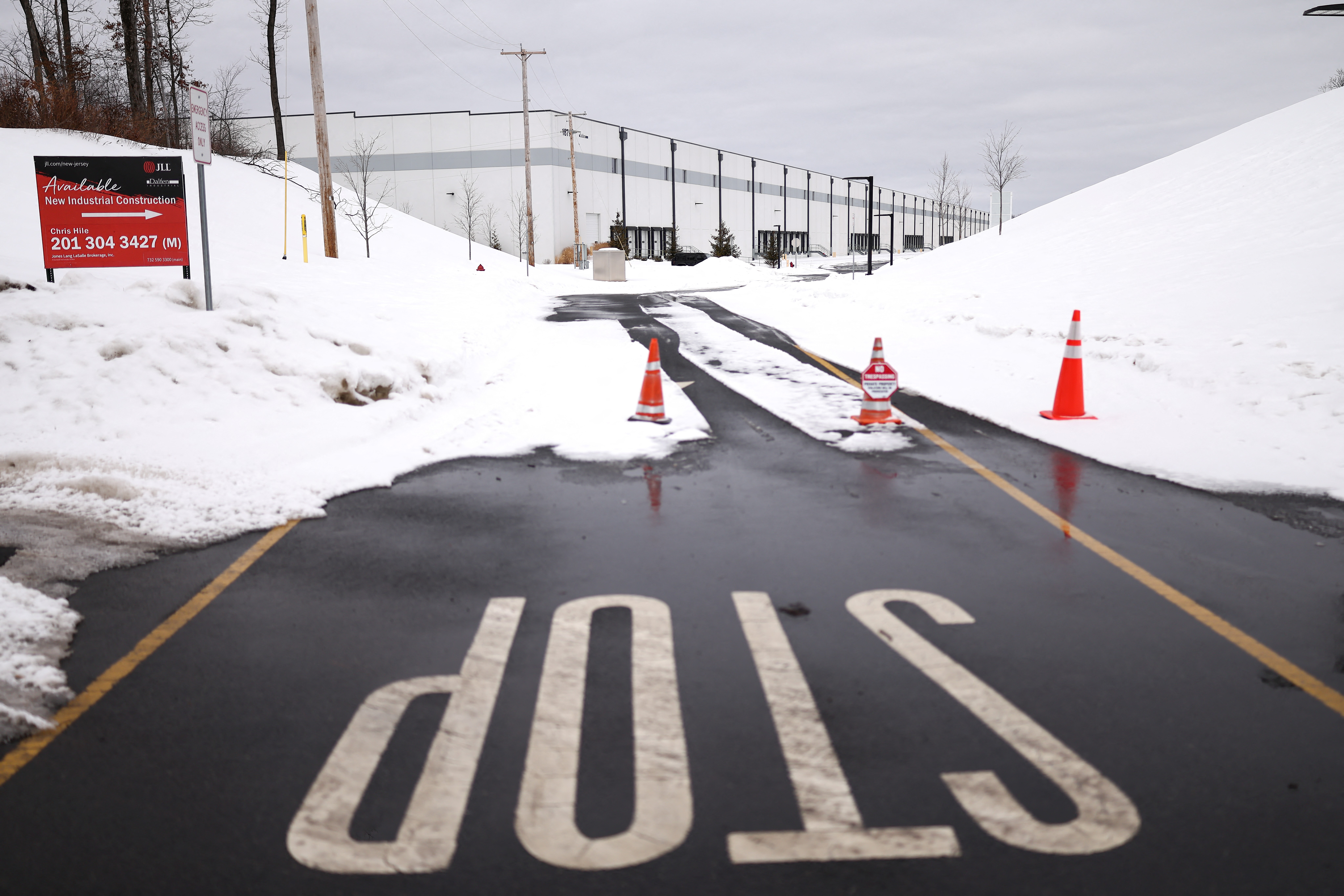 View of a warehouse US Immigration and Customs Enforcement (ICE) plan to become a detention center for detained undocumented immigrants in Roxbury, New Jersey, on February 16, 2026. Activists say the Department of Homeland Security is considering converting this industrial warehouse into a US Immigration and Customs Enforcement (ICE) detention center which faces the opposition of the local community. (Photo by CHARLY TRIBALLEAU / AFP via Getty Images)