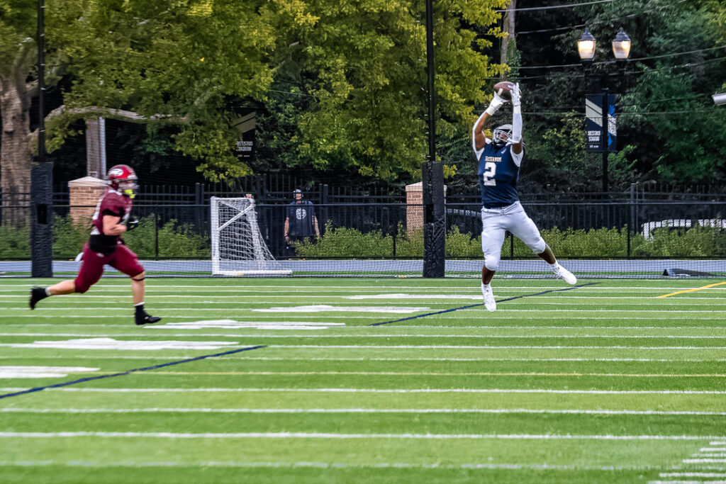 Junior EstherVell Cotton leaps into the air to come down with the catch.