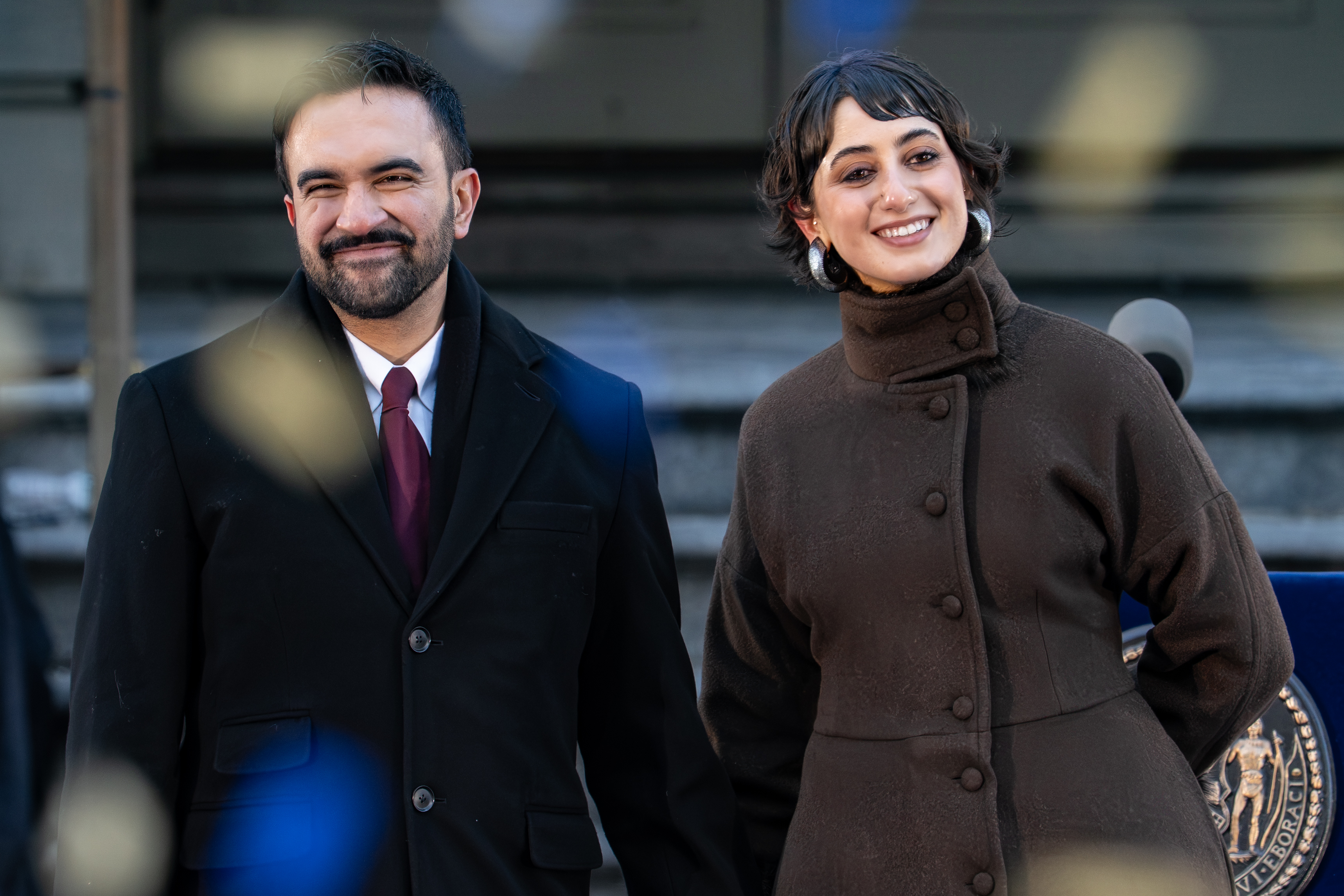 NEW YORK, NEW YORK - JANUARY 01: New York Mayor Zohran Mamdani and his wife Rama Duwaji smile as confetti falls after his ceremonial inauguration as mayor at City Hall Thursday January 1, 2026 in New York, NY. Mamdani has added a "block party" to the official inauguration events to allow thousands of New Yorkers to take part. Mamdani was officially sworn in at midnight by New York Attorney General Letitia James at the Old City Hall subway station in a private ceremony. (Photo by David Dee Delgado/Getty Images)