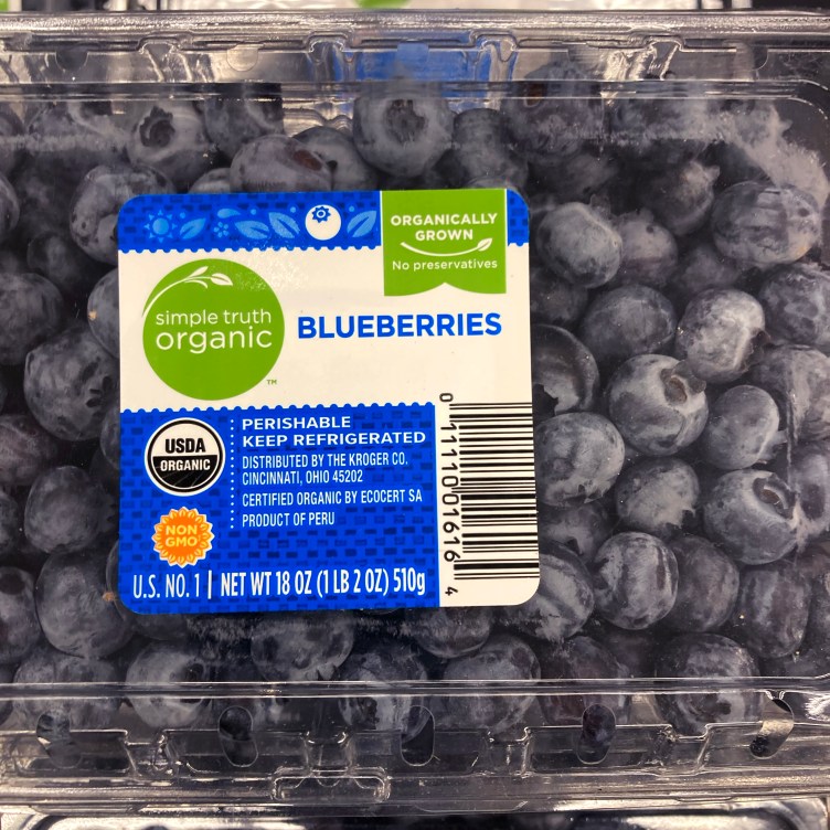 A grid of six blueberry packages with different labels.
